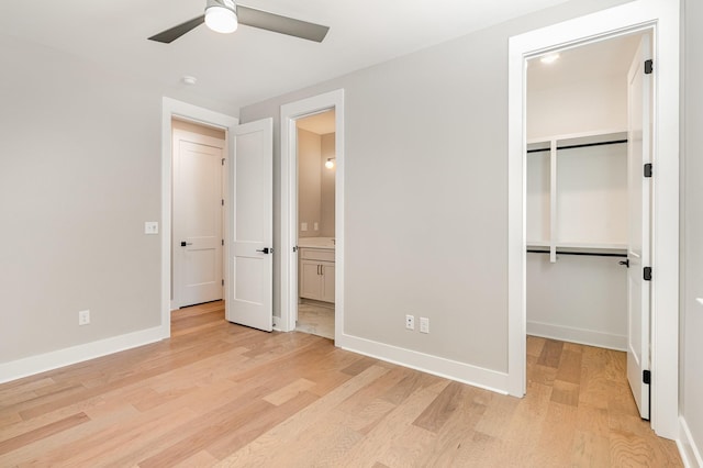 3106B Wellington Ave, Nashville, TN 37212 - unfurnished bedroom featuring connected bathroom, light wood-style flooring, a closet, ceiling fan, and baseboards