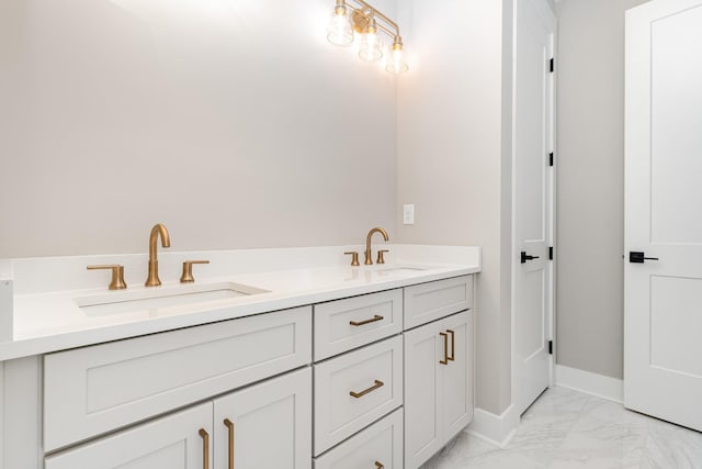 3106B Wellington Ave, Nashville, TN 37212 - bathroom featuring baseboards, marble finish floor, double vanity, and a sink