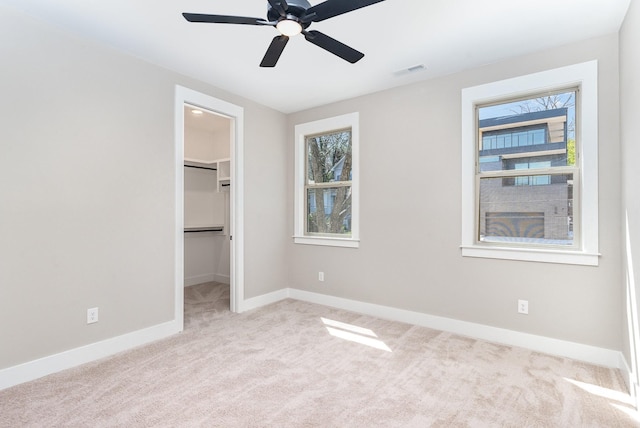 3106B Wellington Ave, Nashville, TN 37212 - unfurnished bedroom with carpet floors, visible vents, baseboards, and a walk in closet