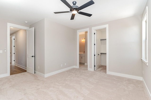 3106B Wellington Ave, Nashville, TN 37212 - unfurnished bedroom with baseboards, a ceiling fan, light carpet, and connected bathroom