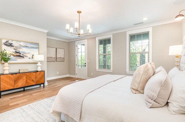3106B Wellington Ave, Nashville, TN 37212 - bedroom featuring visible vents, a chandelier, baseboards, ornamental molding, and wood finished floors