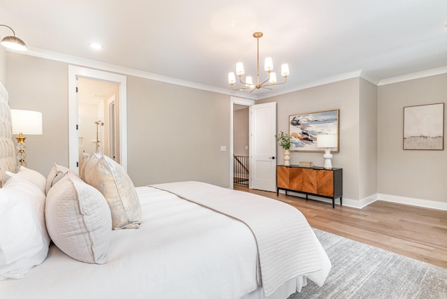 3106B Wellington Ave, Nashville, TN 37212 - bedroom featuring connected bathroom, a chandelier, baseboards, ornamental molding, and wood finished floors
