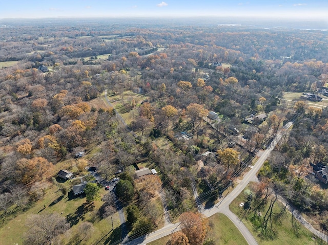 aerial view featuring a view of trees