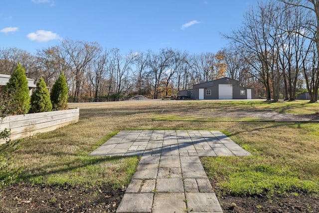 view of yard with a garage