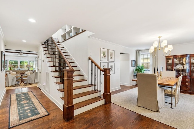 210 Cherokee Rd, Nashville, TN 37205 - dining room with ceiling fan with notable chandelier, ornamental molding, recessed lighting, stairway, and wood finished floors