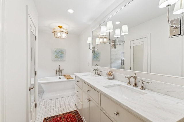210 Cherokee Rd, Nashville, TN 37205 - full bathroom featuring a sink, a freestanding bath, a shower stall, and recessed lighting
