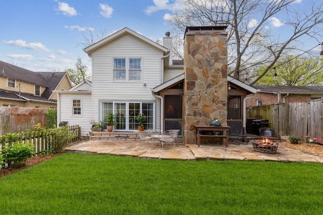 210 Cherokee Rd, Nashville, TN 37205 - back of house featuring a patio area, an outdoor fire pit, fence, and a lawn