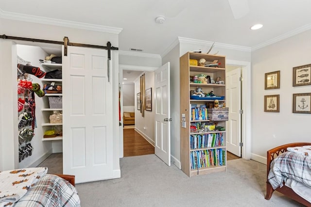 210 Cherokee Rd, Nashville, TN 37205 - carpeted bedroom featuring crown molding, baseboards, recessed lighting, and a barn door