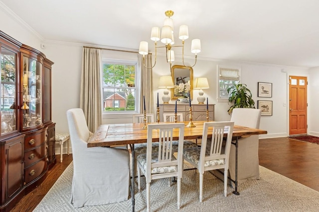 210 Cherokee Rd, Nashville, TN 37205 - dining room with a chandelier, dark wood-type flooring, crown molding, and a healthy amount of sunlight
