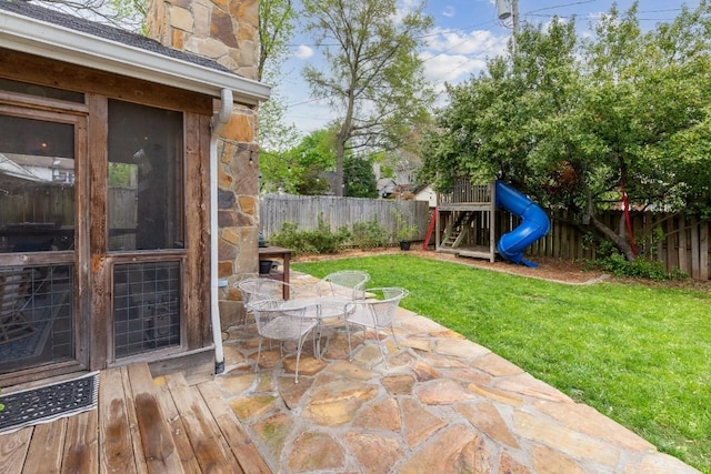 210 Cherokee Rd, Nashville, TN 37205 - view of yard featuring a playground, a patio, a fenced backyard, and outdoor dining area