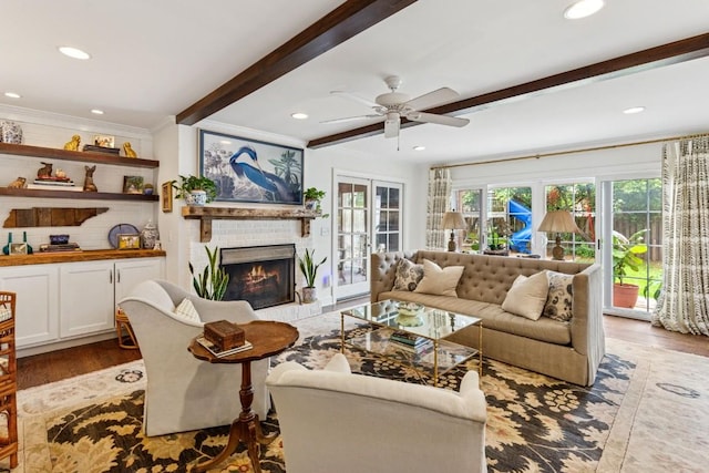 210 Cherokee Rd, Nashville, TN 37205 - living room featuring crown molding, beam ceiling, a brick fireplace, and wood finished floors