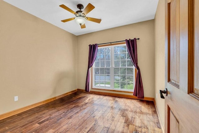 700 Falls Rd, Monterey, TN 38574 - empty room with hardwood / wood-style flooring, baseboards, and a ceiling fan