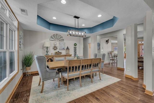 700 Falls Rd, Monterey, TN 38574 - dining space with a raised ceiling, wood finished floors, and baseboards