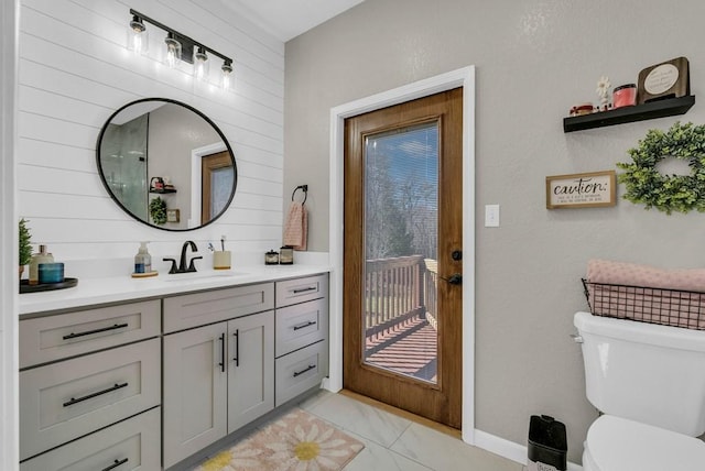 700 Falls Rd, Monterey, TN 38574 - bathroom with toilet, vanity, and baseboards