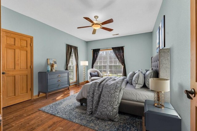 700 Falls Rd, Monterey, TN 38574 - bedroom with ceiling fan, visible vents, and wood finished floors