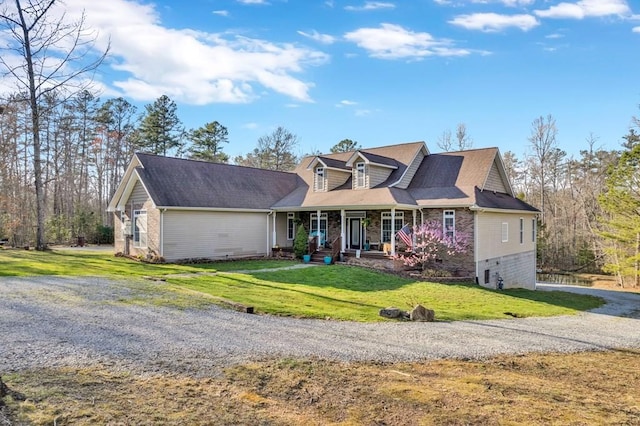 700 Falls Rd, Monterey, TN 38574 - view of front of home with driveway, a porch, and a front lawn