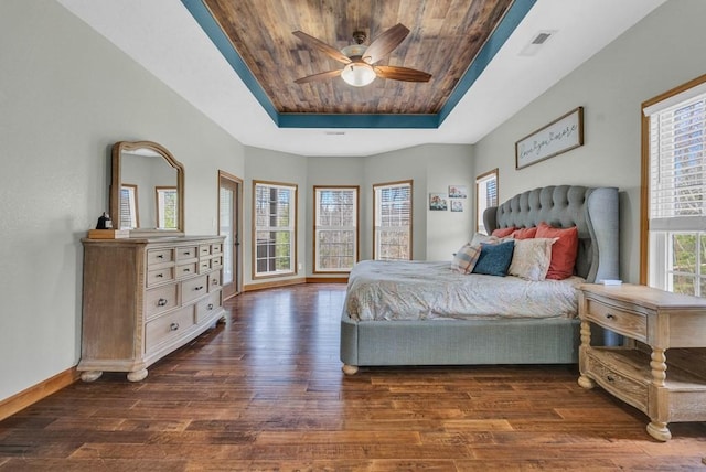 700 Falls Rd, Monterey, TN 38574 - bedroom with dark wood finished floors, a ceiling fan, wood ceiling, a raised ceiling, and baseboards