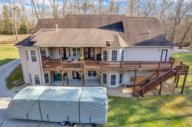 700 Falls Rd, Monterey, TN 38574 - rear view of property with a patio, a shingled roof, a wooden deck, and a lawn