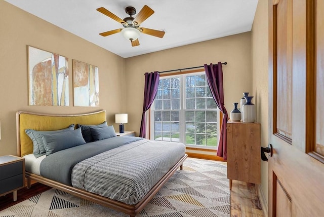 700 Falls Rd, Monterey, TN 38574 - bedroom featuring light wood-style flooring, ceiling fan, and multiple windows