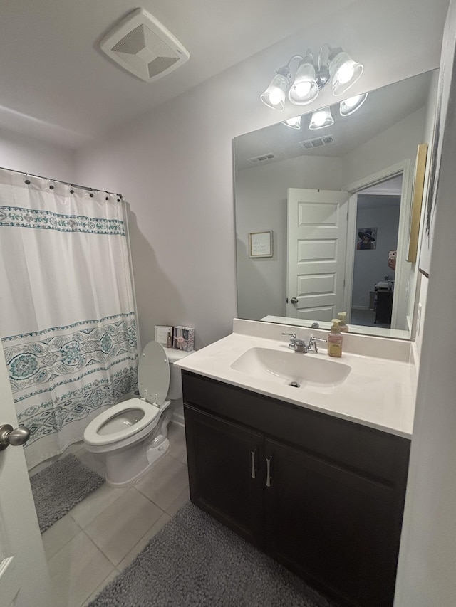 bathroom with visible vents, tile patterned floors, toilet, and vanity