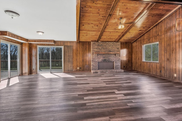 1500 Lock B Rd S, Clarksville, TN 37040 - unfurnished living room with wooden walls, wood finished floors, wooden ceiling, and lofted ceiling with beams