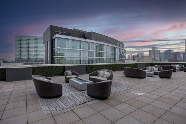 600 12th Ave S Unit 521, Nashville, TN 37203 - view of patio / terrace with an outdoor living space with a fire pit and a view of city