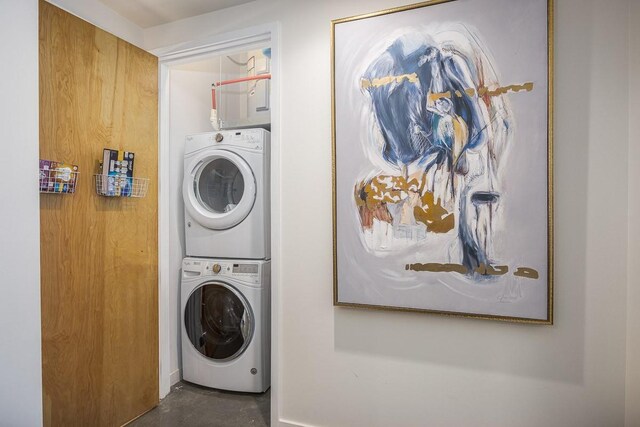 600 12th Ave S Unit 521, Nashville, TN 37203 - laundry area with laundry area and stacked washer / drying machine