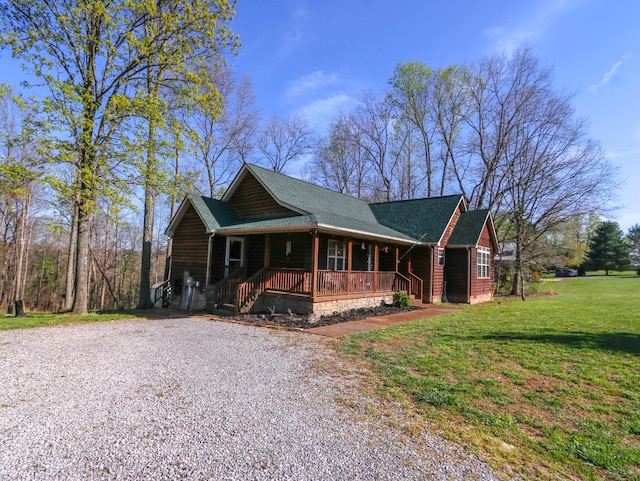 1047 Fort Hl, Portland, TN 37148 - view of front of property featuring a porch, a front lawn, and gravel driveway