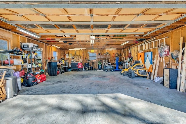 garage with a workshop area