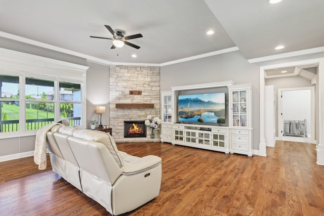 2042 Imagine Cir, Spring Hill, TN 37174 - living area with ceiling fan, a stone fireplace, crown molding, wood finished floors, and baseboards