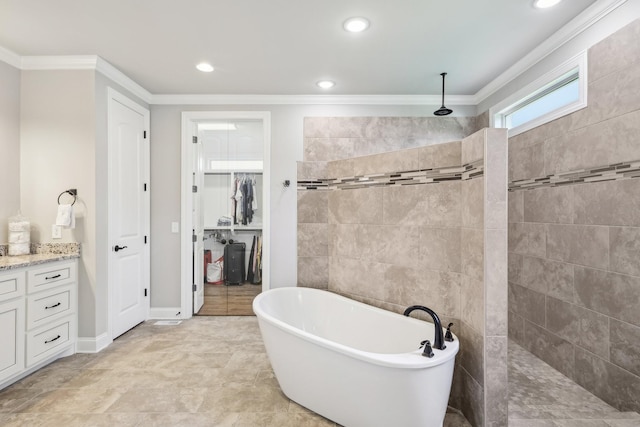 2042 Imagine Cir, Spring Hill, TN 37174 - full bath featuring crown molding, walk in shower, a freestanding bath, recessed lighting, and vanity