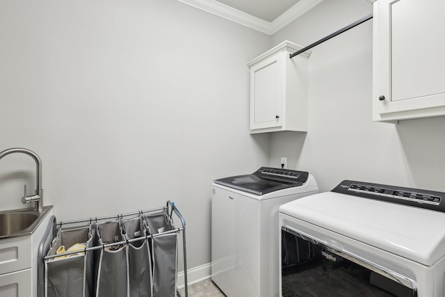 2042 Imagine Cir, Spring Hill, TN 37174 - washroom with cabinet space, washer and dryer, ornamental molding, and baseboards