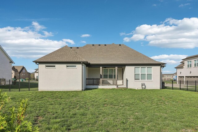 2042 Imagine Cir, Spring Hill, TN 37174 - rear view of house featuring a shingled roof, brick siding, and a porch