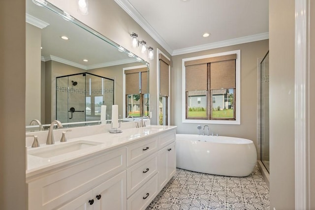 full bath with a shower stall, tile patterned floors, a sink, and ornamental molding