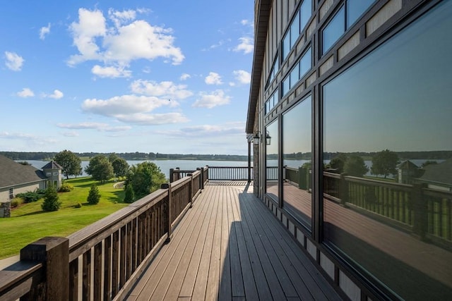 wooden terrace with a water view