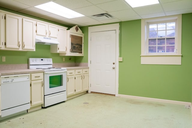 1601 Harvie Mills Rd W, Cookeville, TN 38501 - kitchen featuring baseboards, white appliances, white cabinets, under cabinet range hood, and visible vents