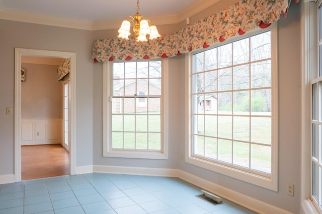 1601 Harvie Mills Rd W, Cookeville, TN 38501 - unfurnished dining area with a healthy amount of sunlight, a notable chandelier, ornamental molding, and visible vents
