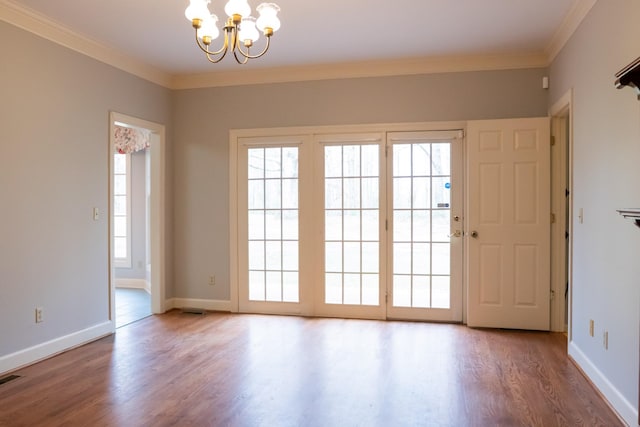 1601 Harvie Mills Rd W, Cookeville, TN 38501 - interior space with a chandelier, wood finished floors, and ornamental molding