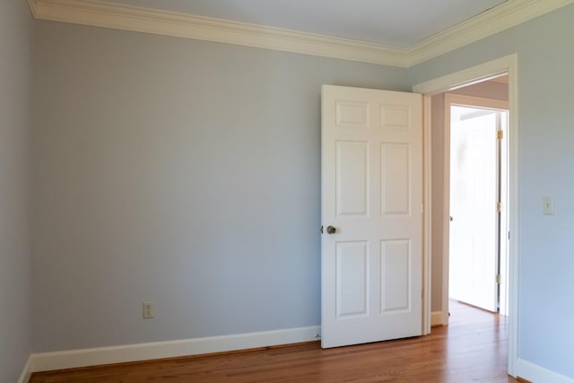 1601 Harvie Mills Rd W, Cookeville, TN 38501 - unfurnished room with crown molding, baseboards, and wood finished floors