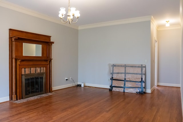 1601 Harvie Mills Rd W, Cookeville, TN 38501 - unfurnished living room featuring ornamental molding, a notable chandelier, wood finished floors, and a fireplace with flush hearth