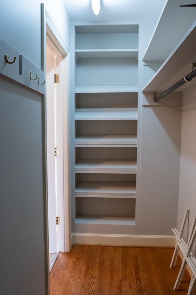 1601 Harvie Mills Rd W, Cookeville, TN 38501 - spacious closet featuring wood finished floors