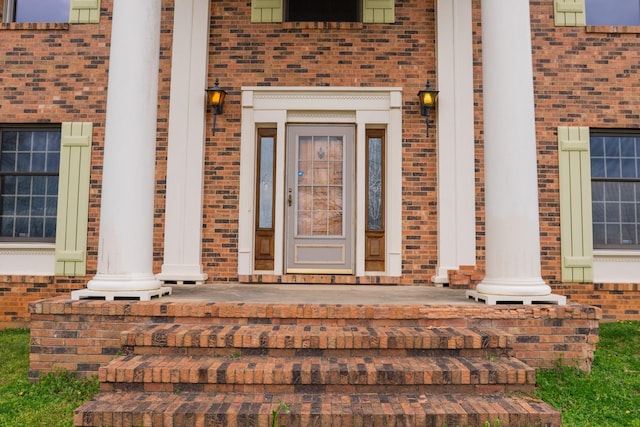 1601 Harvie Mills Rd W, Cookeville, TN 38501 - property entrance with a porch and brick siding