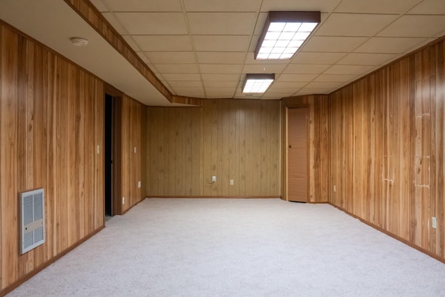 1601 Harvie Mills Rd W, Cookeville, TN 38501 - spare room with light colored carpet, wooden walls, a drop ceiling, and heating unit