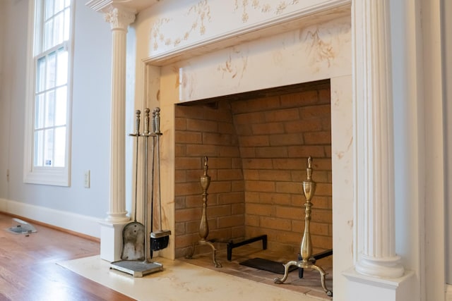 1601 Harvie Mills Rd W, Cookeville, TN 38501 - room details featuring ornate columns, wood finished floors, and baseboards