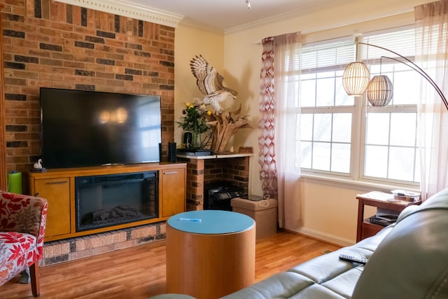 1601 Harvie Mills Rd W, Cookeville, TN 38501 - living area with a wealth of natural light, a brick fireplace, ornamental molding, and wood finished floors