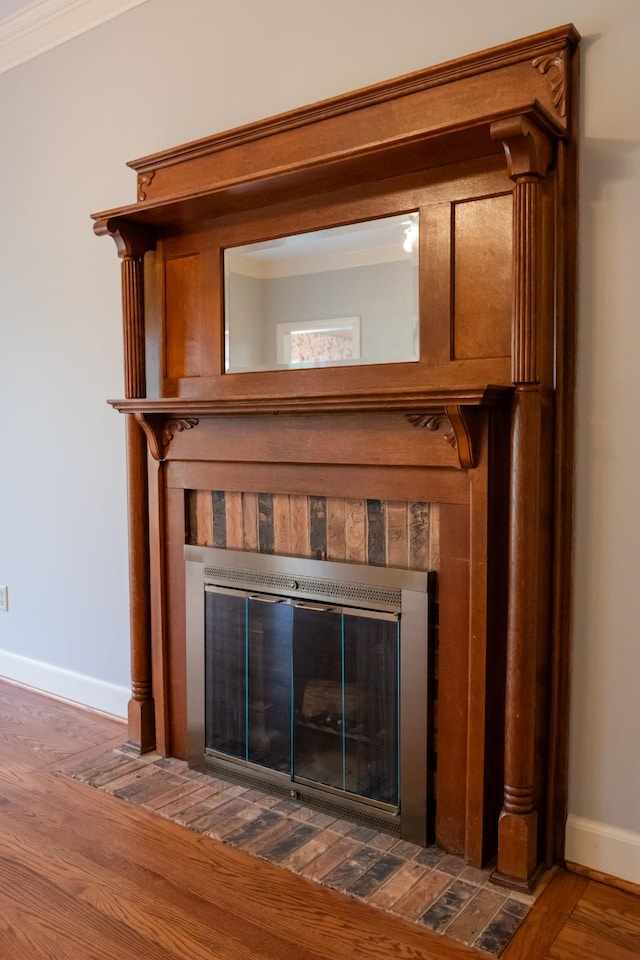 1601 Harvie Mills Rd W, Cookeville, TN 38501 - interior details featuring a tile fireplace, wood finished floors, and baseboards