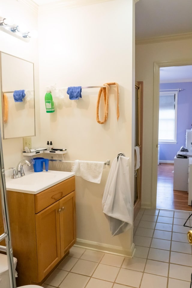 1601 Harvie Mills Rd W, Cookeville, TN 38501 - bathroom with toilet, crown molding, a shower stall, vanity, and tile patterned flooring
