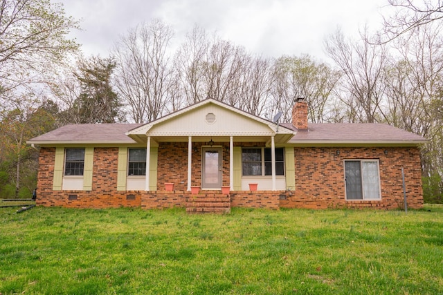 1601 Harvie Mills Rd W, Cookeville, TN 38501 - view of front of property featuring a chimney, a shingled roof, a front yard, and brick siding