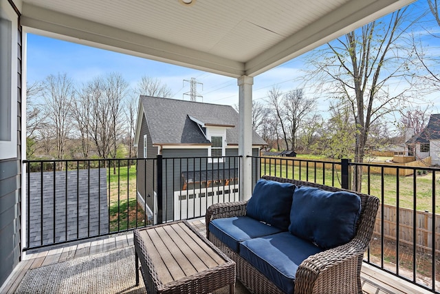 wooden deck with outdoor lounge area