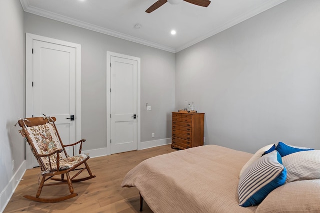 bedroom featuring crown molding, recessed lighting, baseboards, and light wood-style floors
